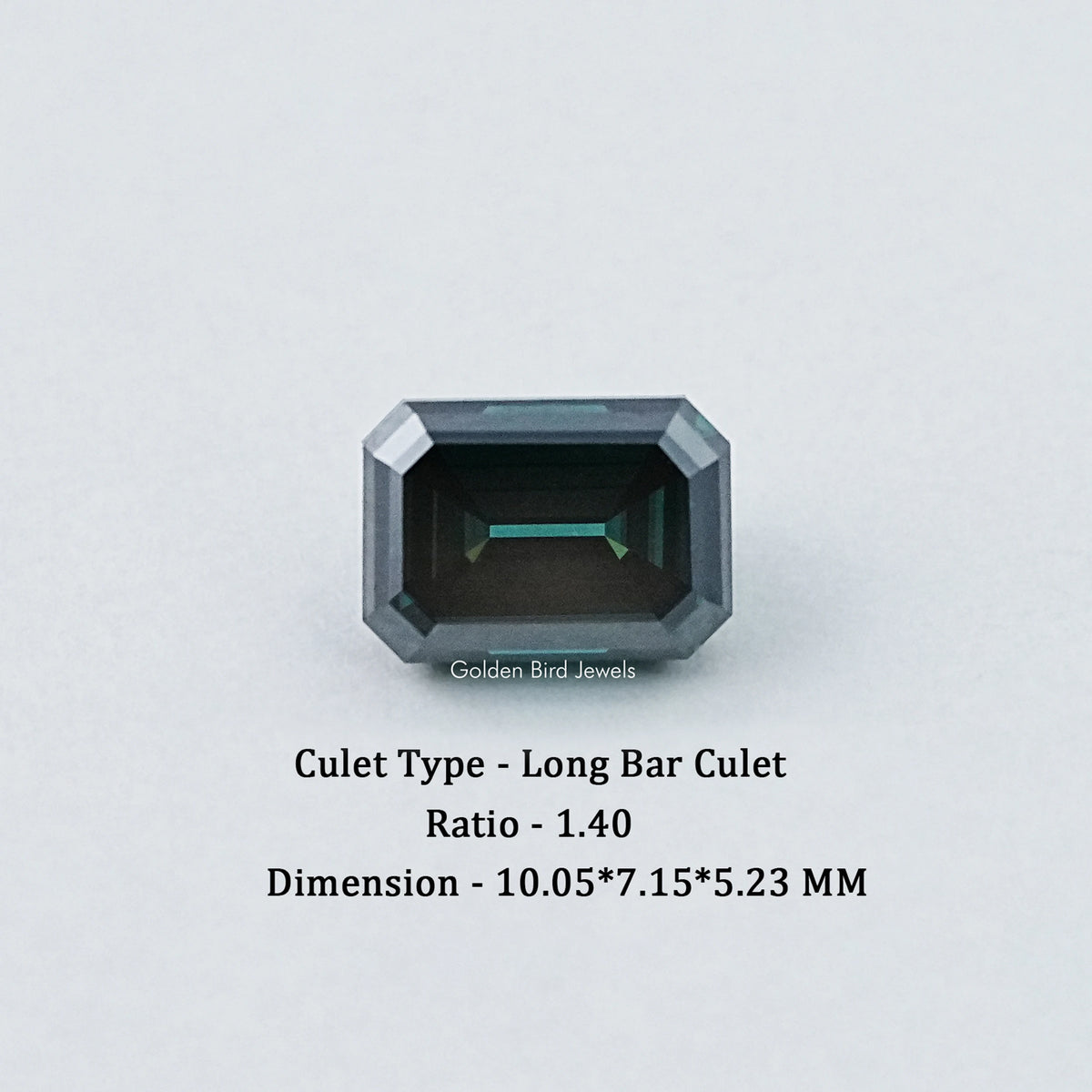 Loose emerald-cut dark green moissanite gemstone, centered view of the table