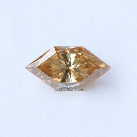 Champagne marquise moissanite loose gemstone, faceted oval-cut with golden tones