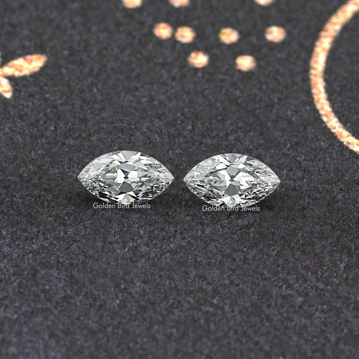 Pair of marquise-cut lab-grown diamonds with sharp facet pattern and shine