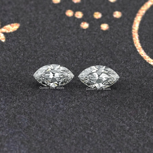 Pair of marquise-cut lab-grown diamonds with sharp facet pattern and shine