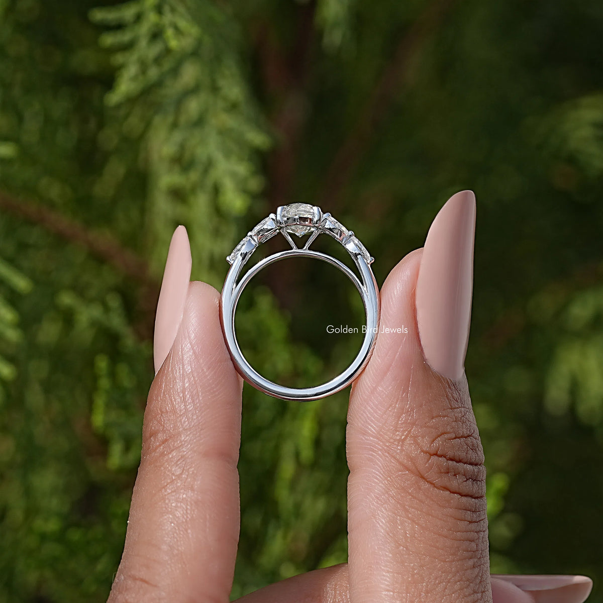Marquise-cut moissanite diamond leaves ring, round side stones and open silver band