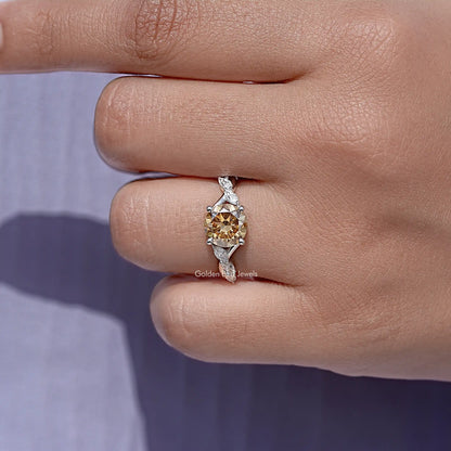 Round yellow moissanite ring with small side stones, sterling silver band