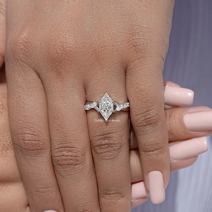Floral moissanite wedding ring in sterling silver, detailed front view on hand