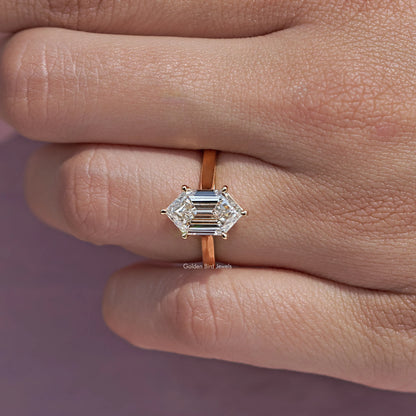 Step-cut marquise diamond ring, geometric setting, close-up side view