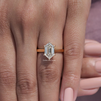 Step-cut marquise diamond ring, front view on hand, rectangular center stone