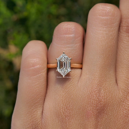Step-cut marquise diamond ring with rectangular step-cut center, front view