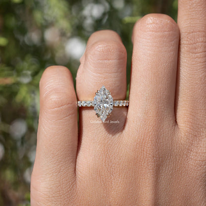 Silver ring featuring marquise-cut moissanite center with micro pave accent stones