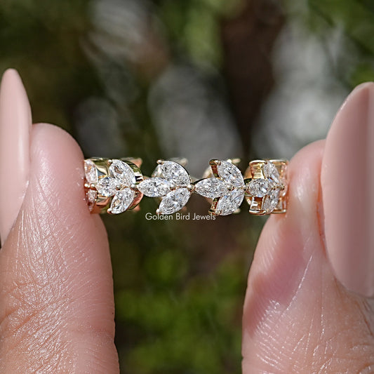 Lab diamond wedding band with marquise stones, gold-tone links; close-up