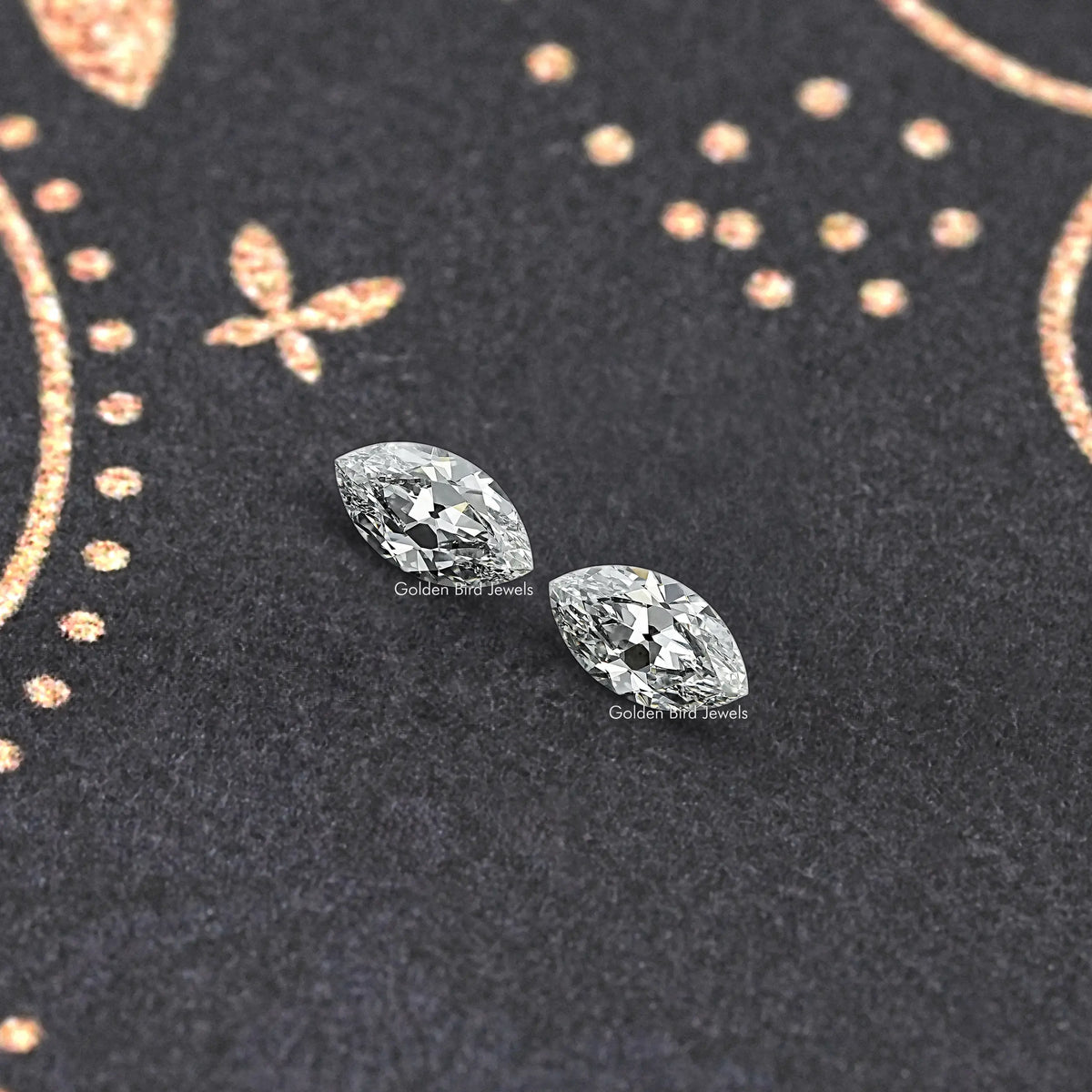 Pair of marquise-cut lab-grown diamonds with bright faceted sparkle