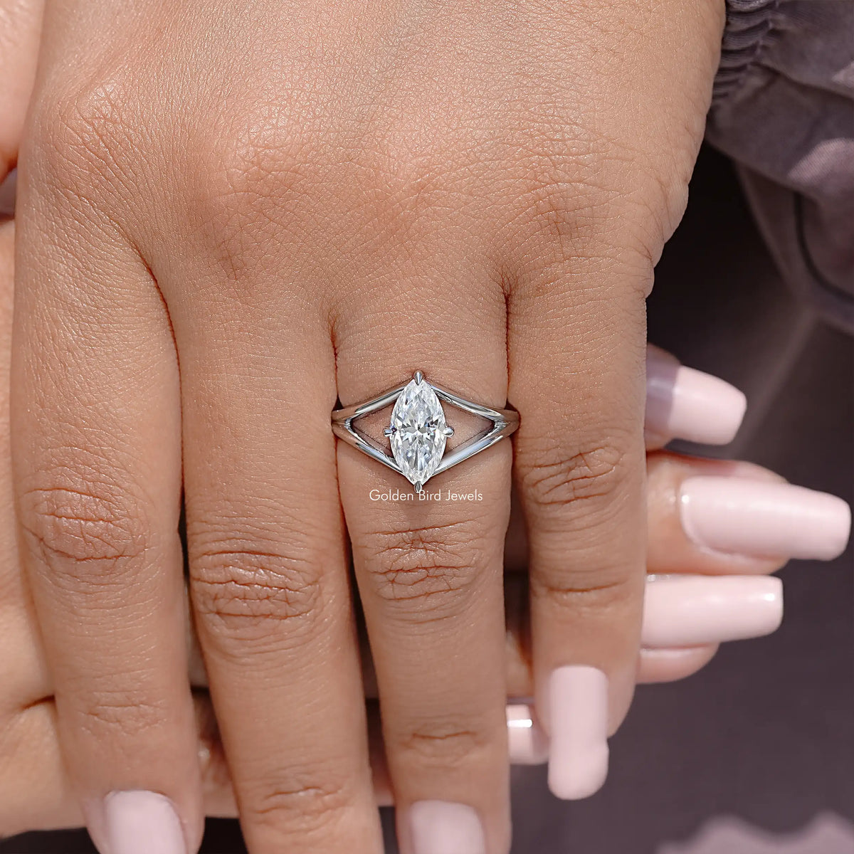 925 sterling silver split-shank ring with marquise moissanite center stone