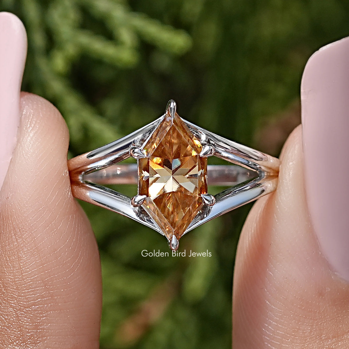 925 sterling silver ring with orange marquise-cut moissanite, split-shank setting