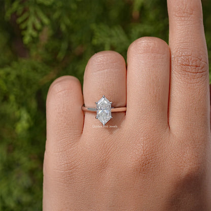 Sterling silver marquise moissanite solitaire ring with slim band, side view on hand