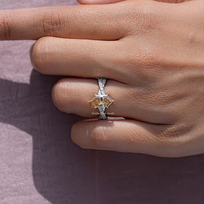 Moissanite accent ring with twisted silver shank and marquise-cut center stone