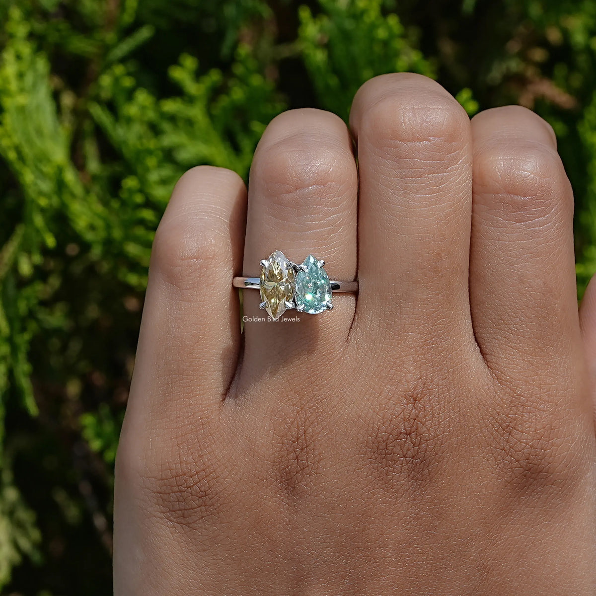 In hand showing view of moissanite Ring	 		
