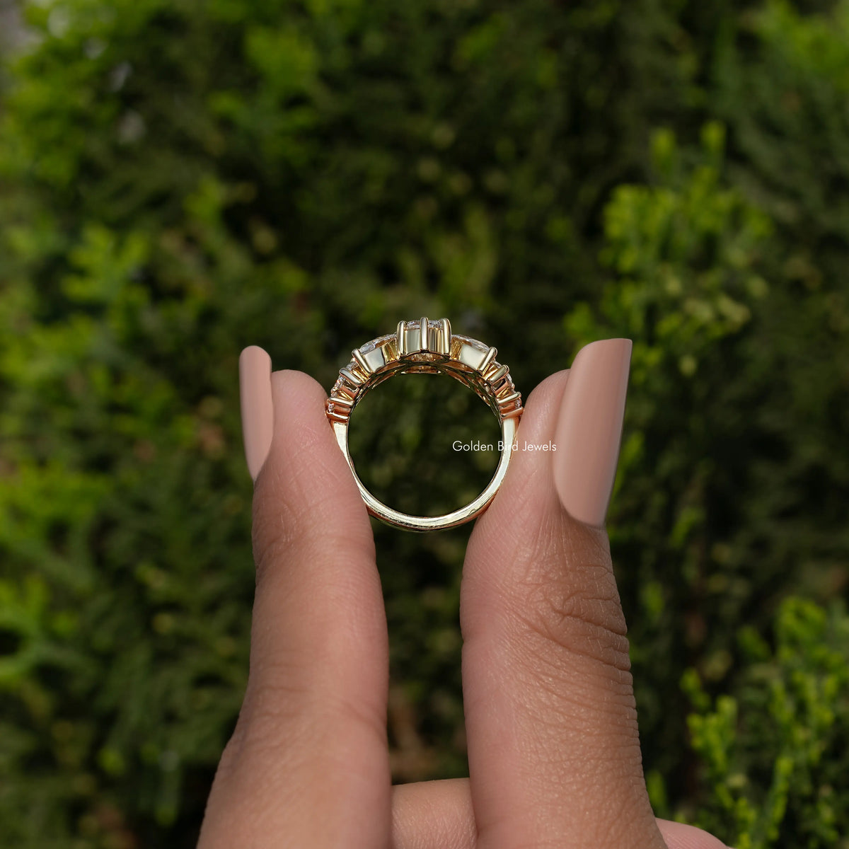 Back view of vintage moissanite ring band with prong setting, gold-tone metal