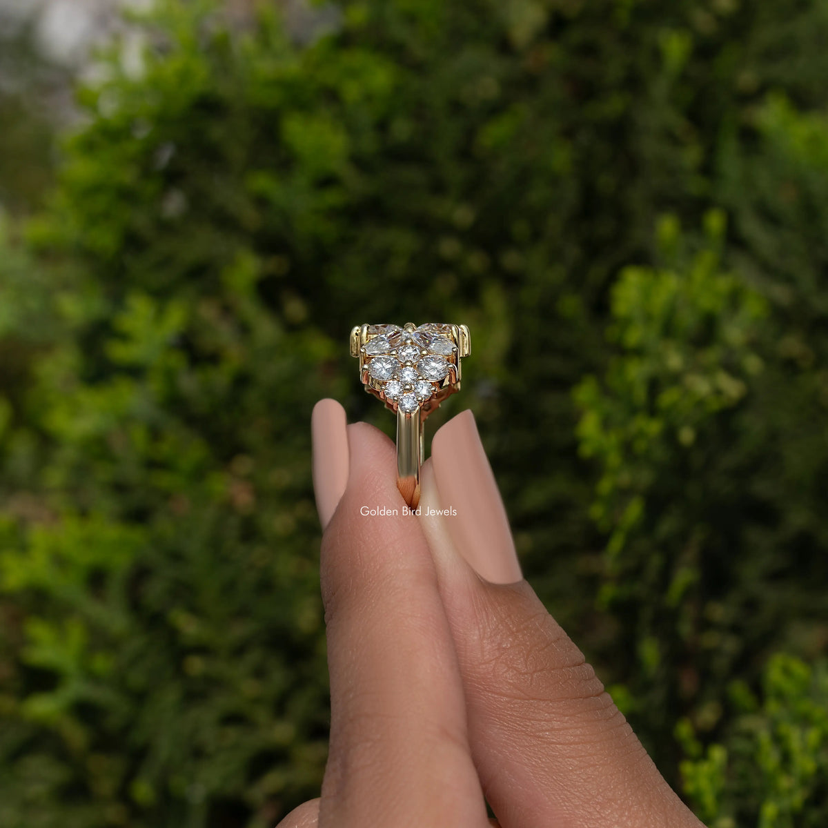 Vintage marquise moissanite ring with heart-like cluster top, gold-tone prongs