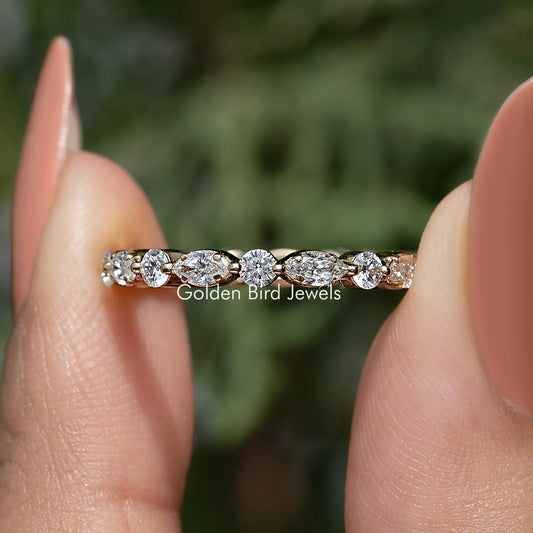 Lab-grown diamond wedding band with marquise and round stones, side profile