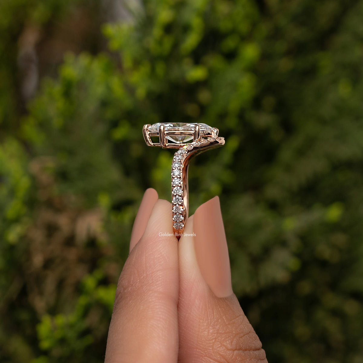 Marquise cut lab grown ring with curved pavé accent band