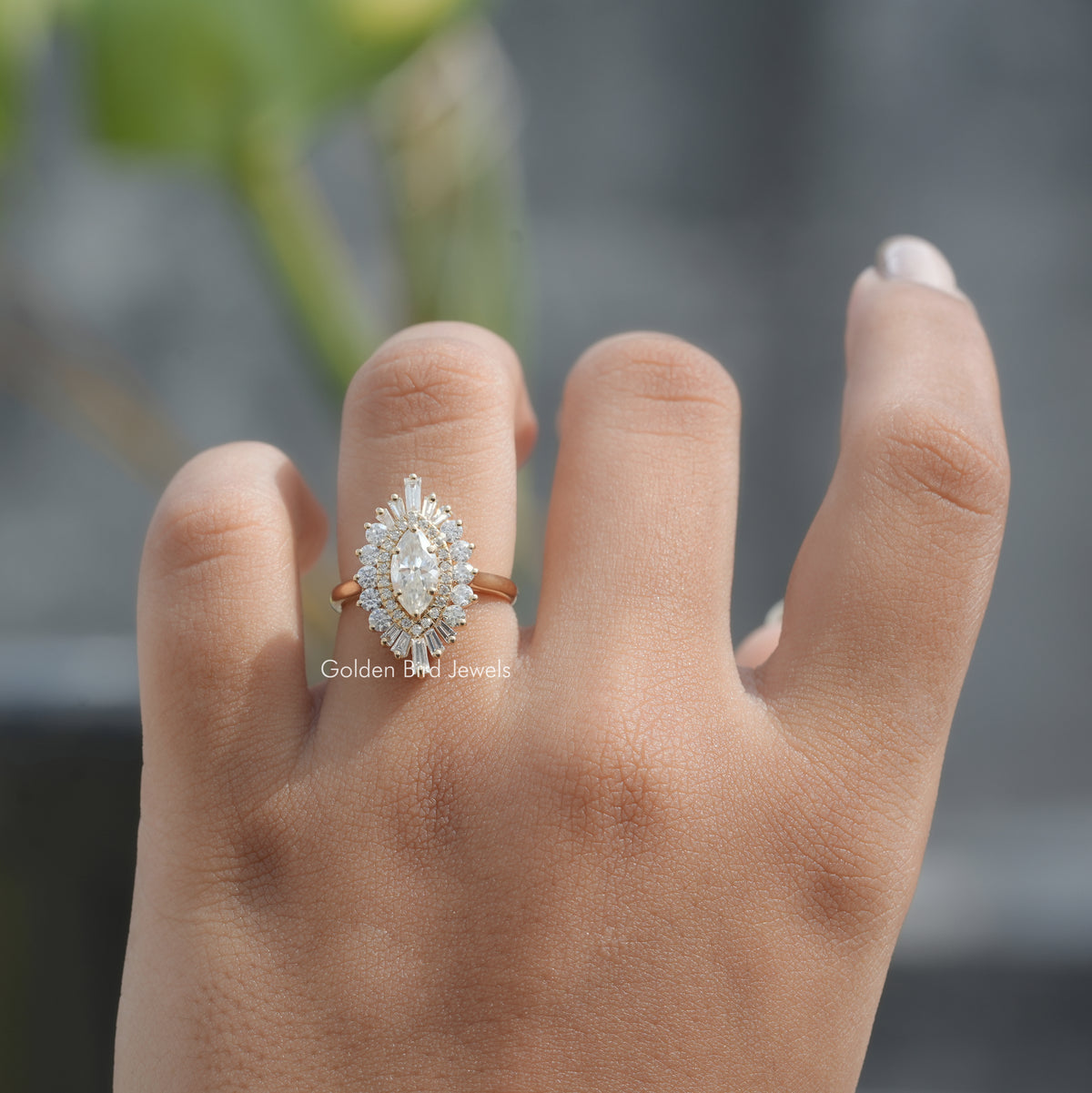 View of Marquise Cut Halo Engagement Ring In Finger 