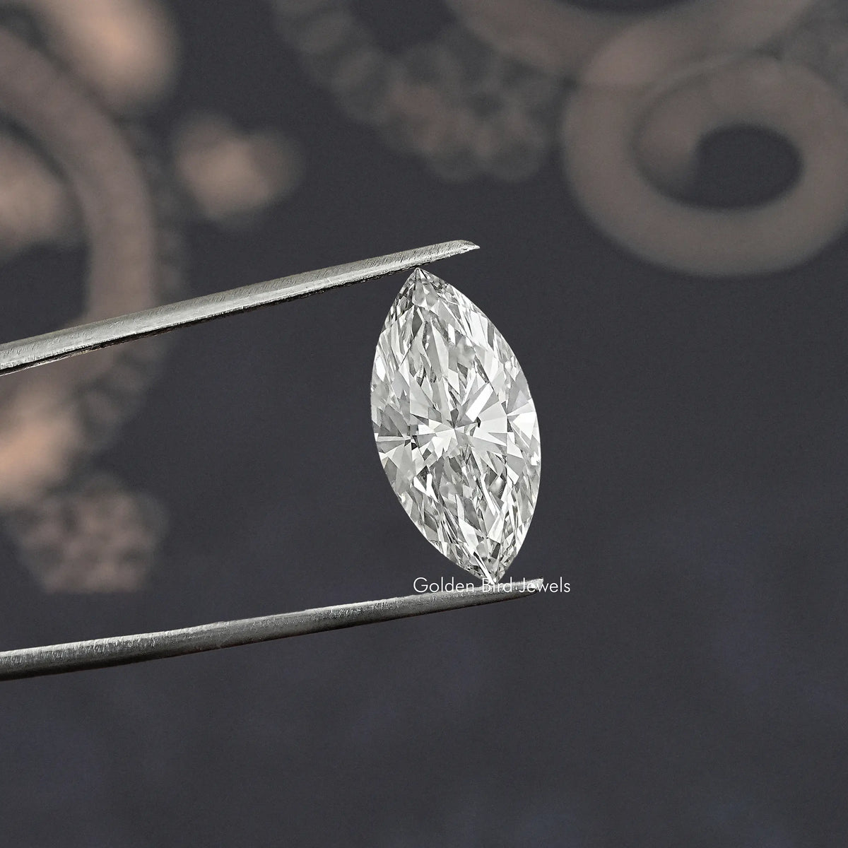 Loose marquise-cut lab diamond on tweezers, close-up of sharp facets