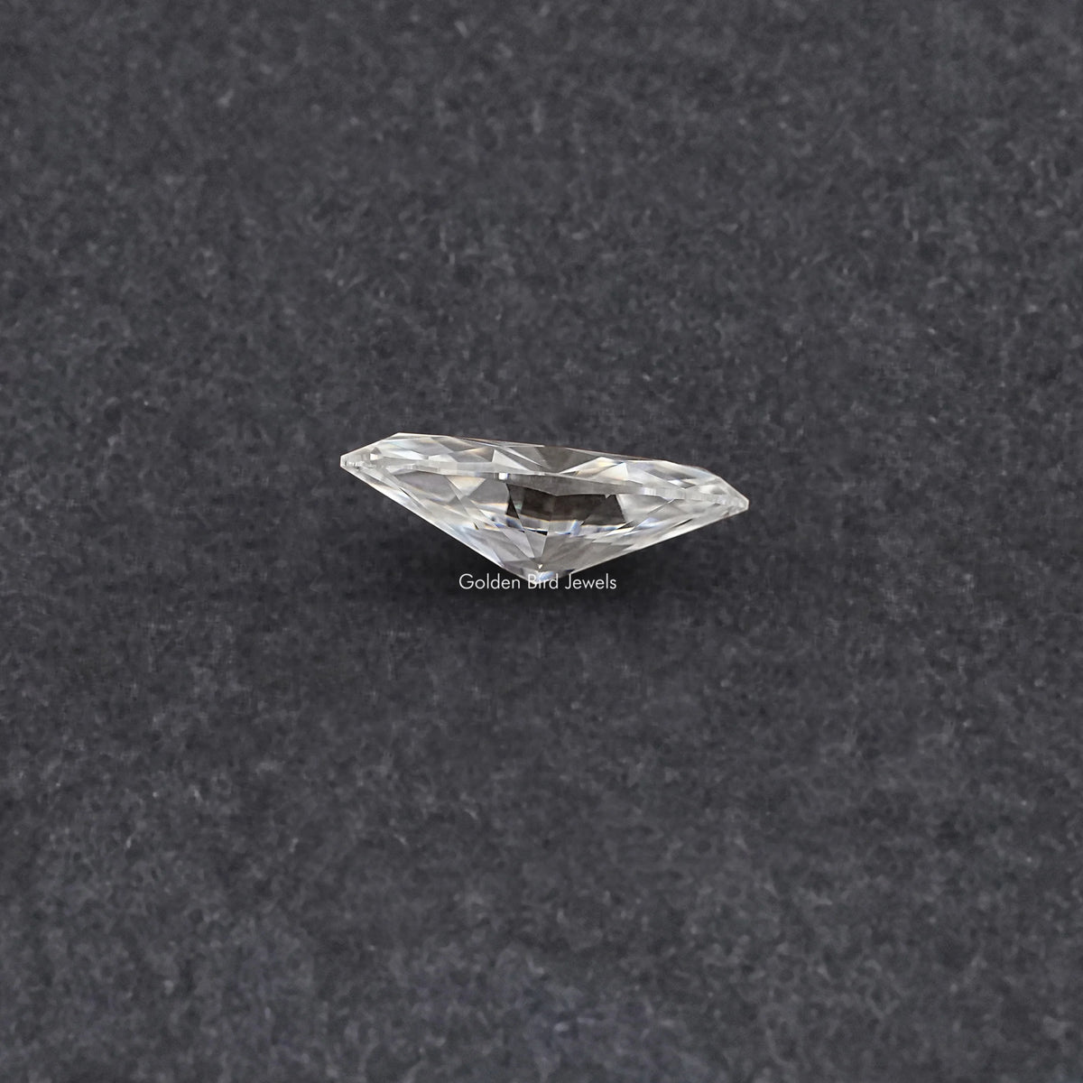 Marquise-cut moissanite loose stone, three-quarter view, clear white facets