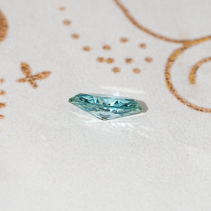 Teal marquise-cut loose moissanite gemstone, faceted sparkle