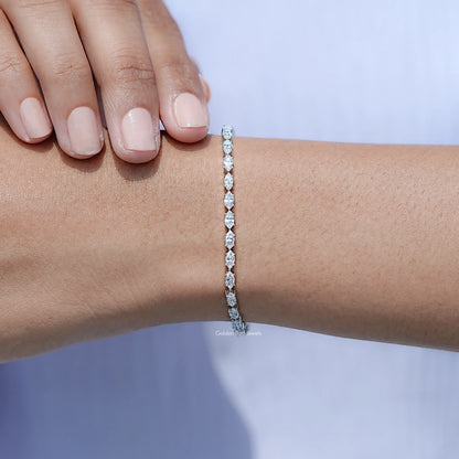 In hand Showing View of Marquise Cut Diamond Tennis Steel Bracelet
