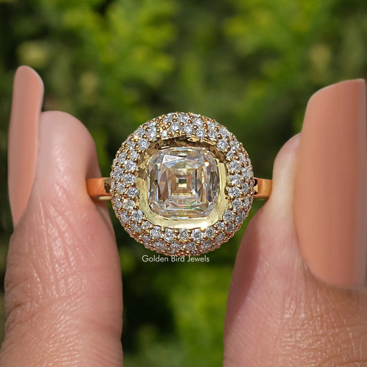 Yellow-gold moissanite halo engagement ring with square-cut center and diamond-style pave