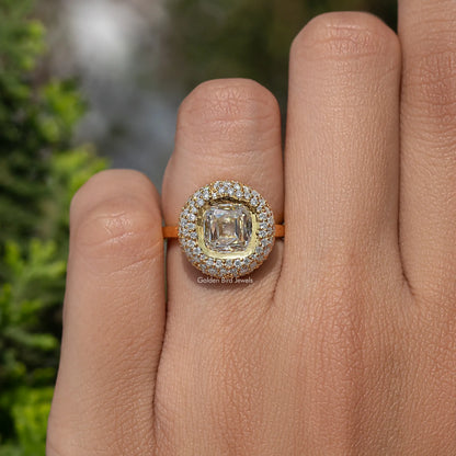 Yellow-gold moissanite halo engagement ring with square center stone and sparkling border