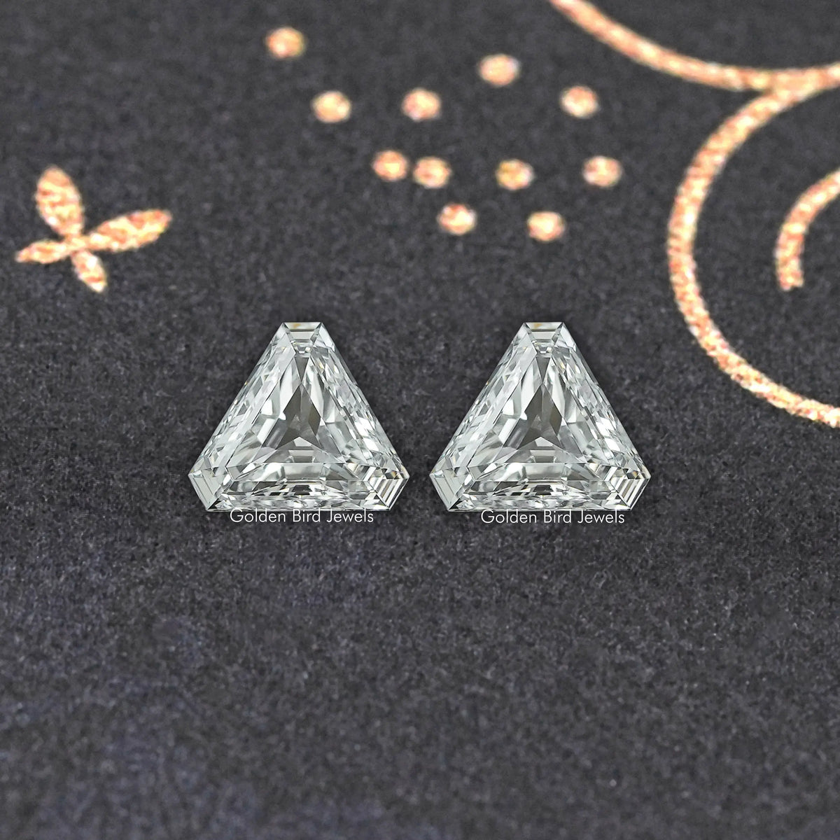 Pair of modified trillion-cut lab-grown diamonds, clear faceted stones