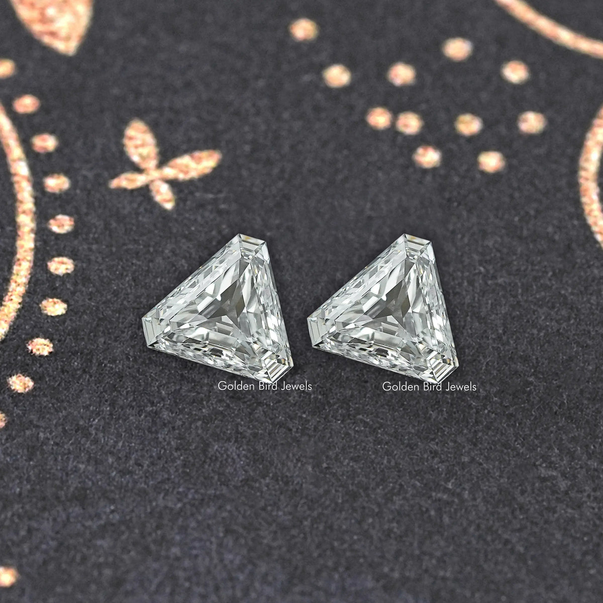 Pair of modified trillion-cut lab-grown diamonds, clear stones