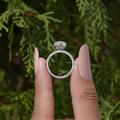 Heart-shaped moissanite solitaire ring, open-back view of silver band