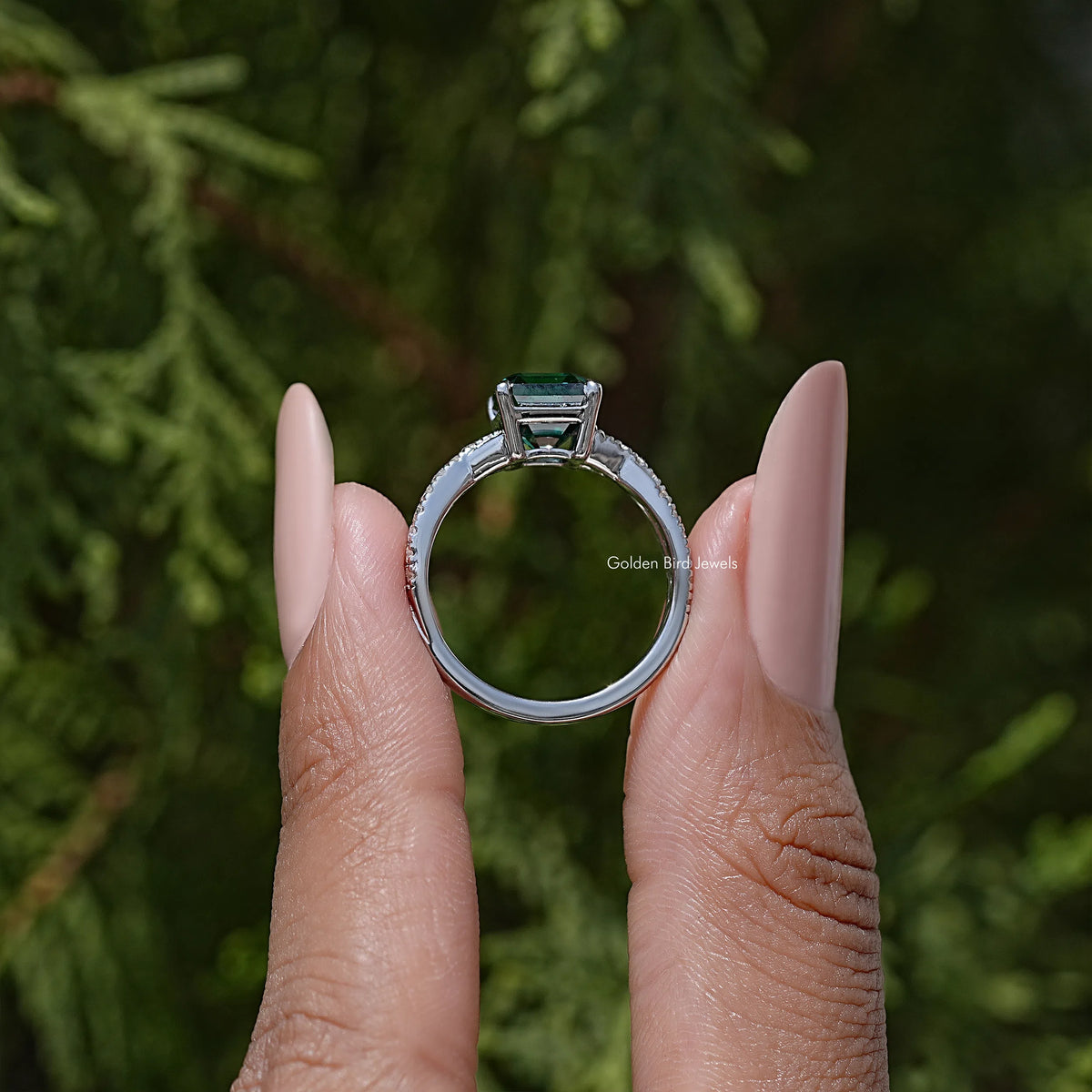 Moissanite ring with asscher-cut center stone, side view