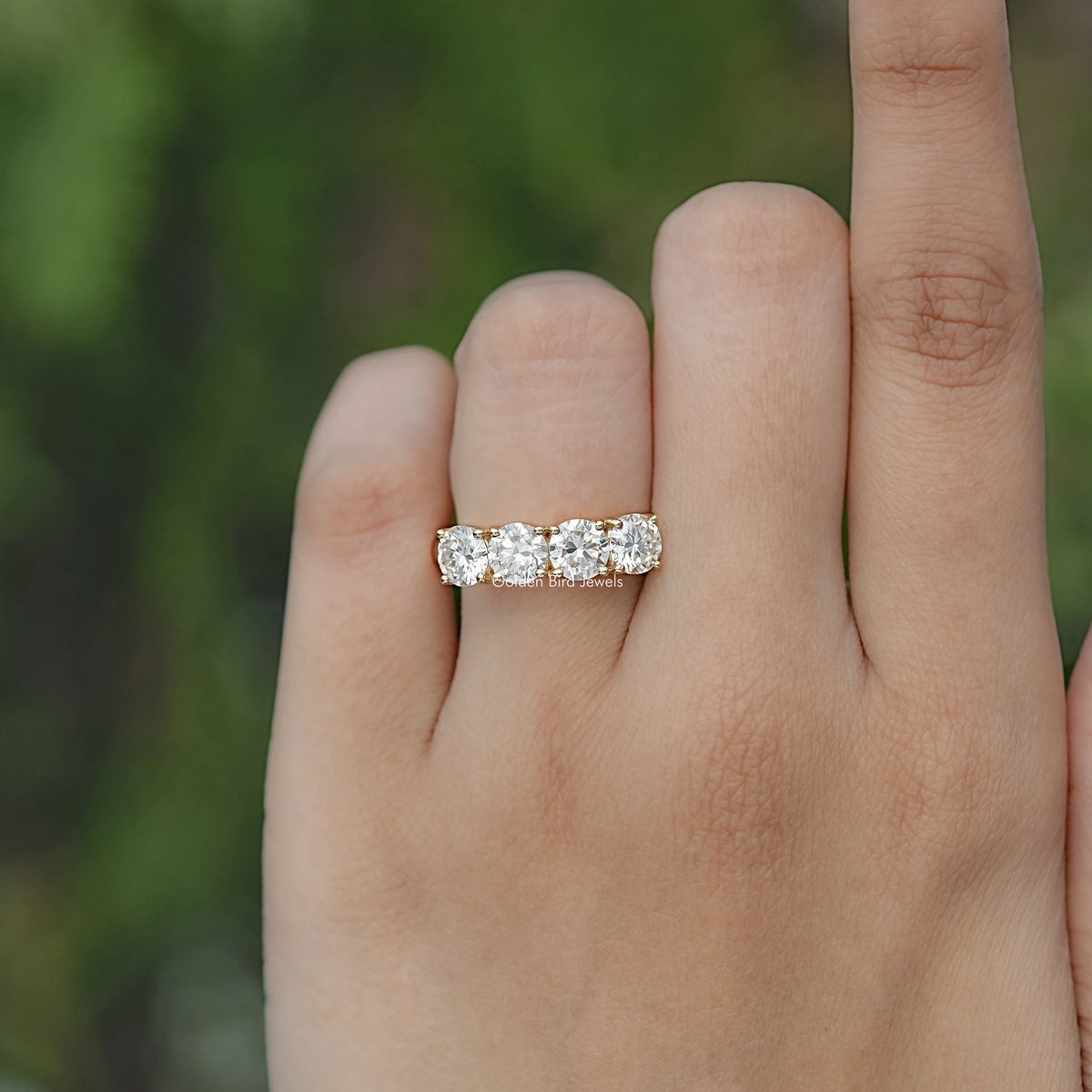 Eternity wedding band with round-cut sparkling stones across a metal band