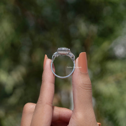 Three-stone moissanite ring band with Asscher-cut center, prong-set halo