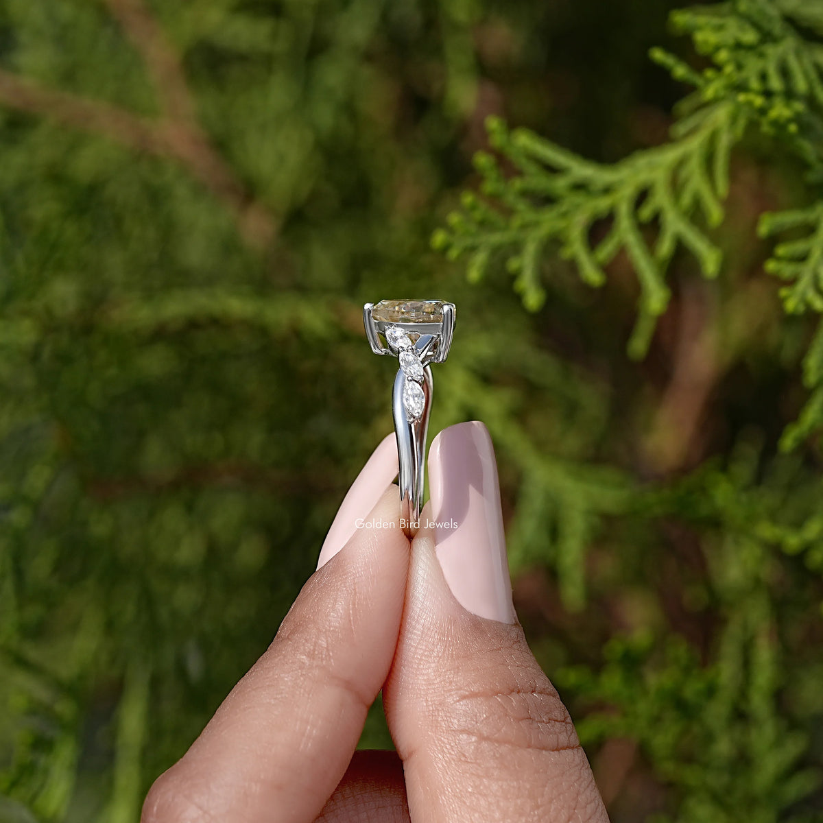 Sterling silver ring with raised heart-shaped center stone in a prong setting