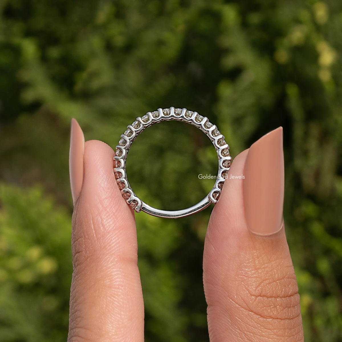 Oval-cut moissanite three-quarter eternity band in 925 sterling silver, top view