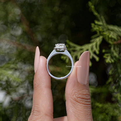 Reverse view: sterling silver ring showing open basket for cushion-cut moissanite