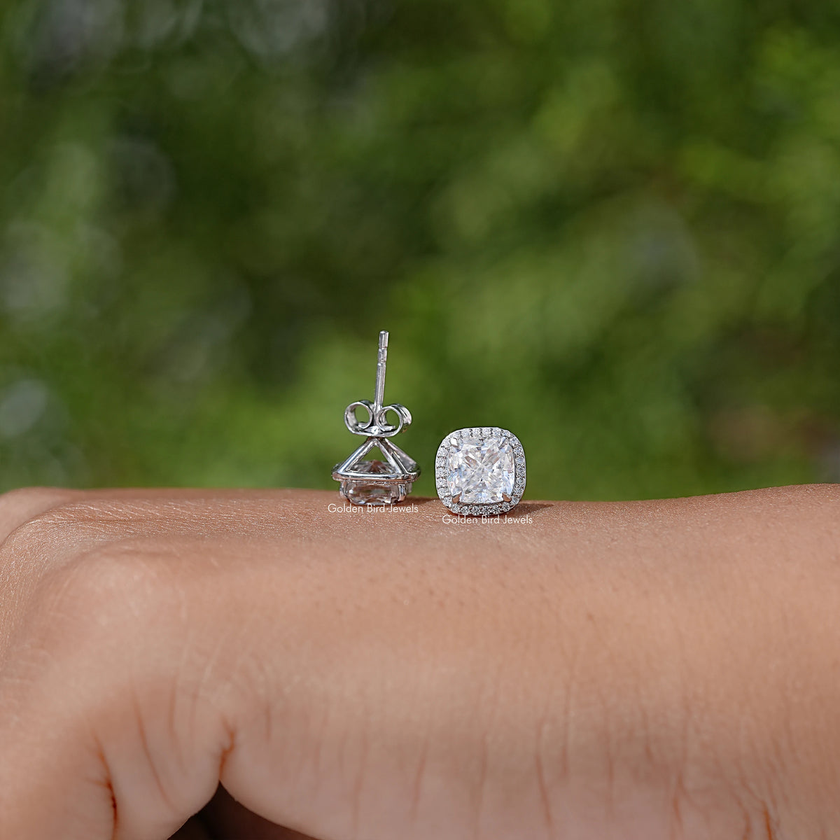 Cushion-cut halo stud earring with visible post and halo setting