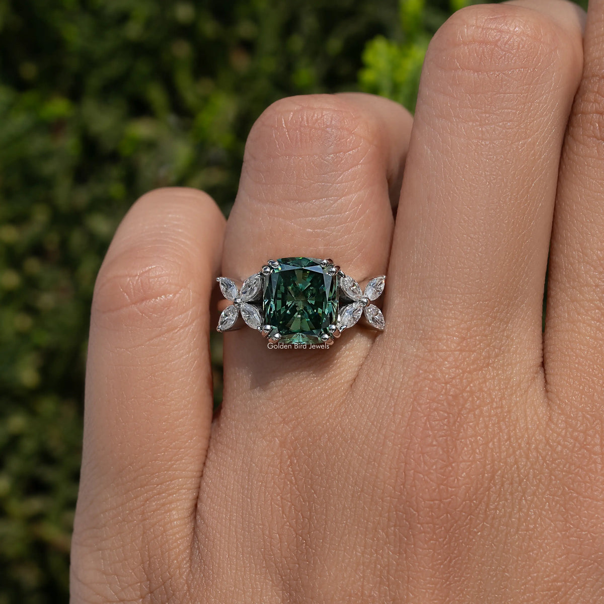 925 sterling silver moissanite ring with green cushion center and marquise side flowers
