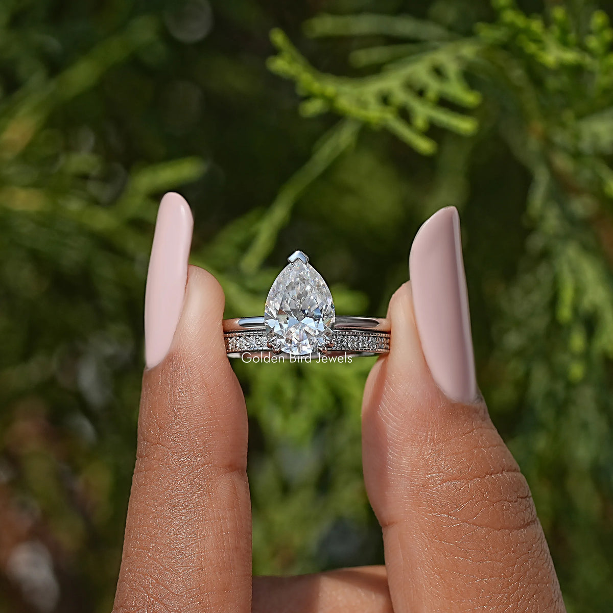 Pear moissanite ring with hidden halo and slim eternity band, silver-tone prongs