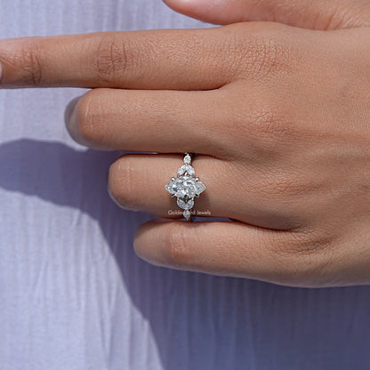 Marquise-cut moissanite diamond leaves ring side view, marquise center and side stones