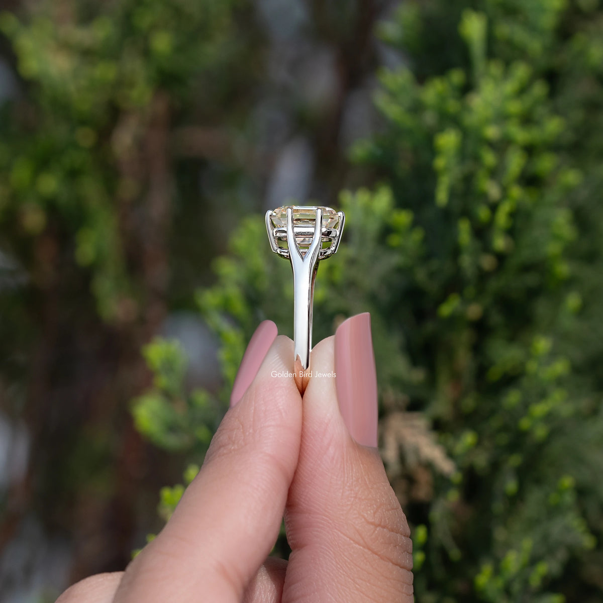 Split-shank ring top view with square yellow stone in four-prong setting