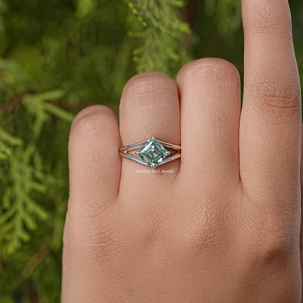 Asscher cut moissanite split shank ring in sterling silver, teal center stone