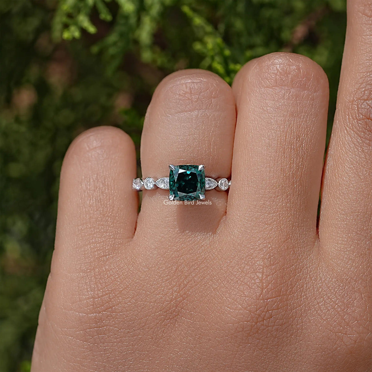 925 sterling silver moissanite engagement ring with cushion-cut teal stone and round diamond band