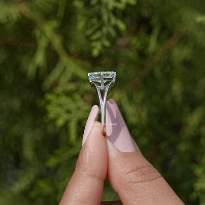 Sterling silver split-shank moissanite ring, angled view of raised princess-cut setting