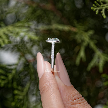 Moissanite accent ring with round-cut center stone and pavé sterling silver band