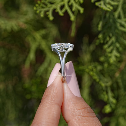 Silver marquise-cut moissanite solitaire ring with split shank and four-prong basket