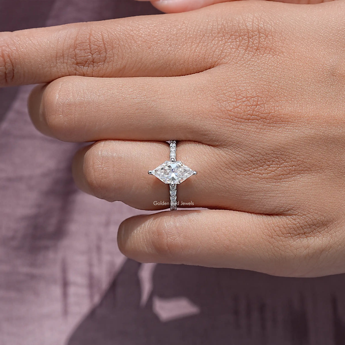 Marquise moissanite solitaire ring with sterling silver band, prong-set marquise center