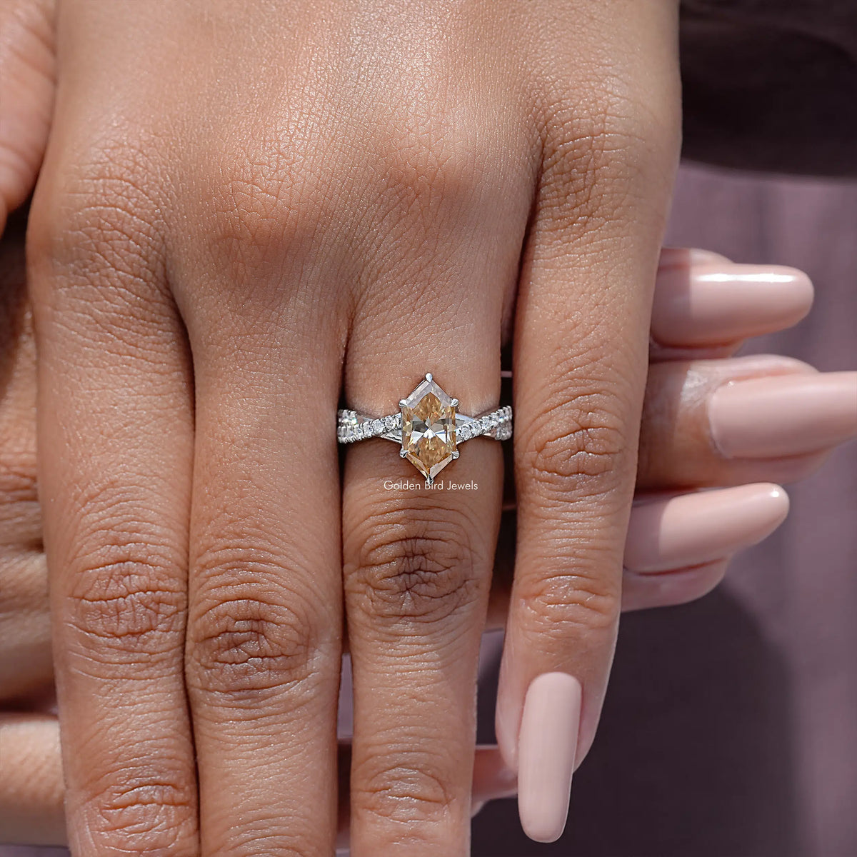 Marquise-cut accent ring in sterling silver, close-up on hand and band